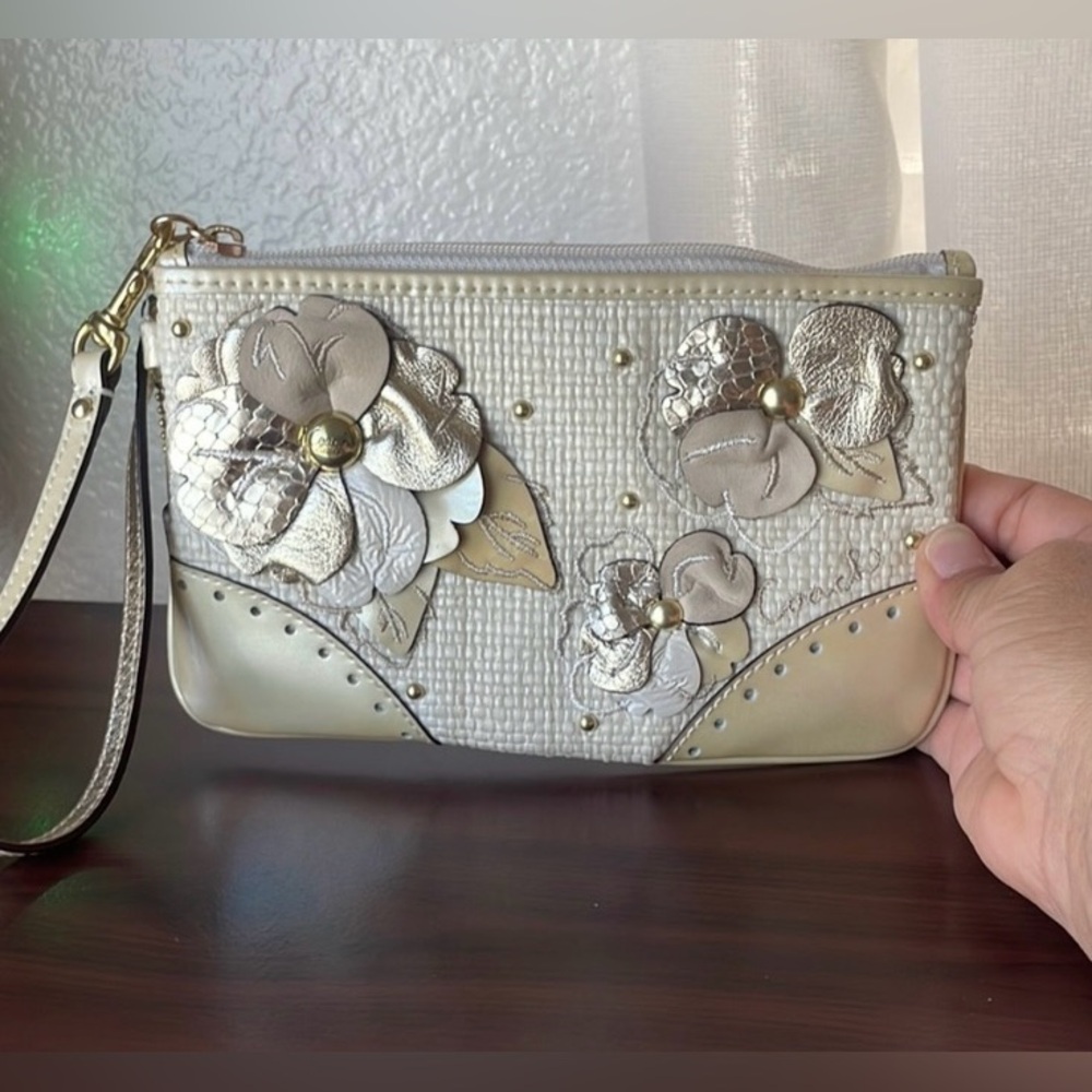 Coach Gold Wristlet with Elegant Textured Design